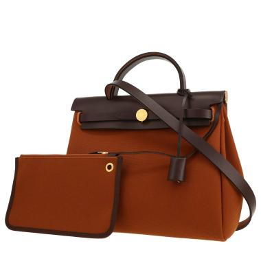Bolso para llevar al hombro o en la mano Hermès  Herbag en lona rojiza y cuero ébano