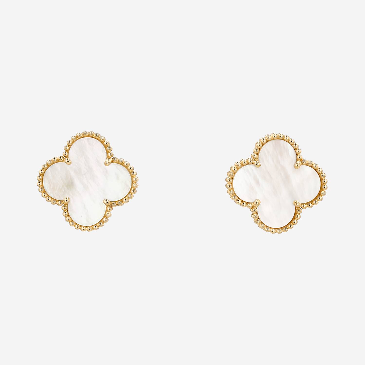 Van Cleef 
Arpels Magic Alhambra earrings in yellow gold and mother of pearl