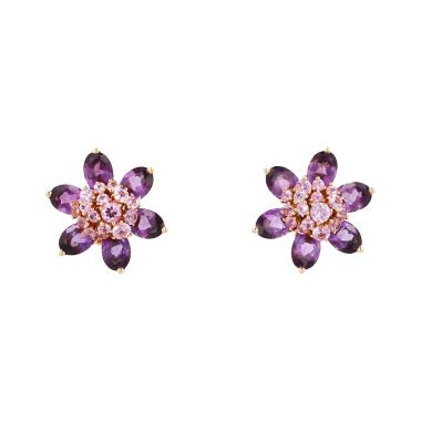 Van Cleef 
Arpels Fleurs d'Hawaï earrings in yellow gold, amethyst and sapphires