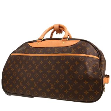 Borsa da viaggio Louis Vuitton  Eole in tela monogram cerata marrone e pelle naturale