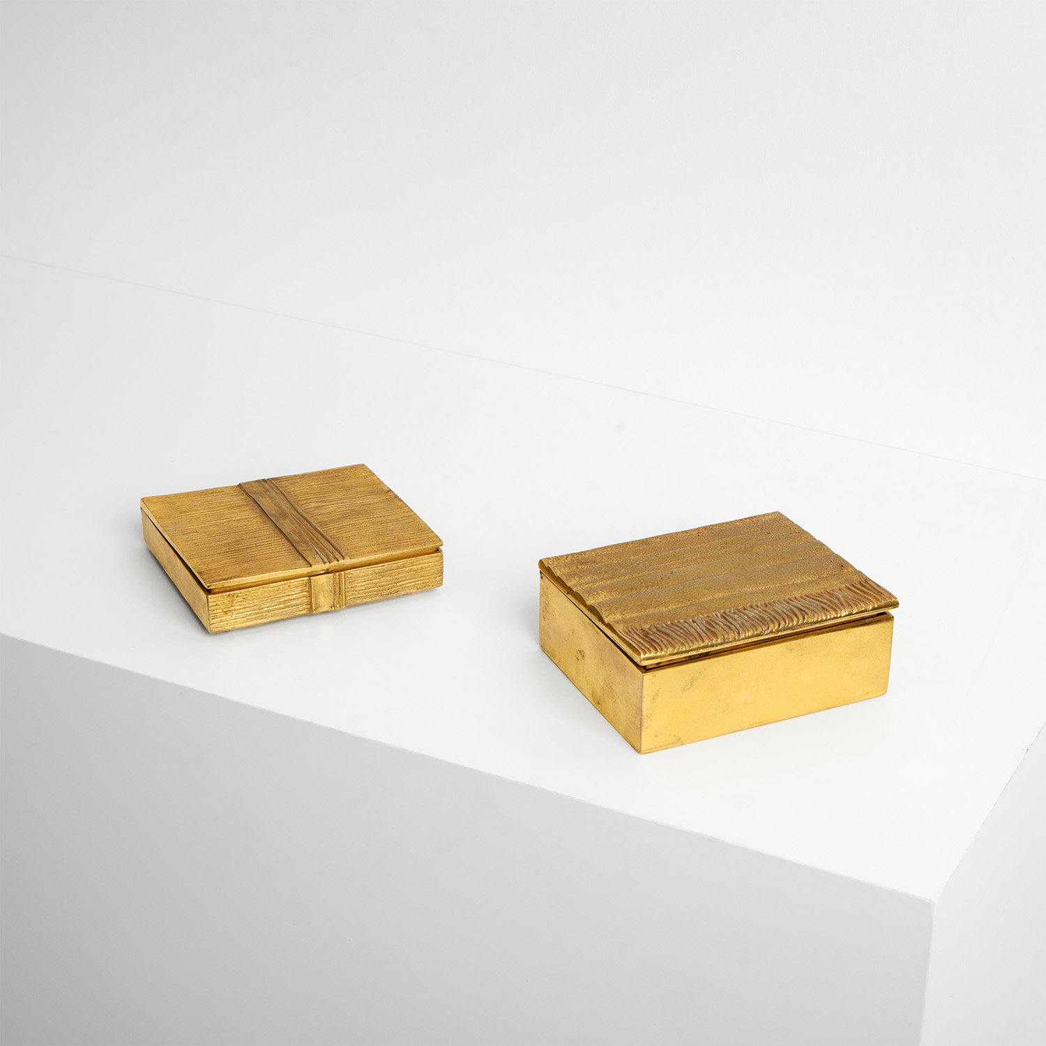 A set of two boxes, 'Étoffe drapée' and Drapé’ models - circa 1945