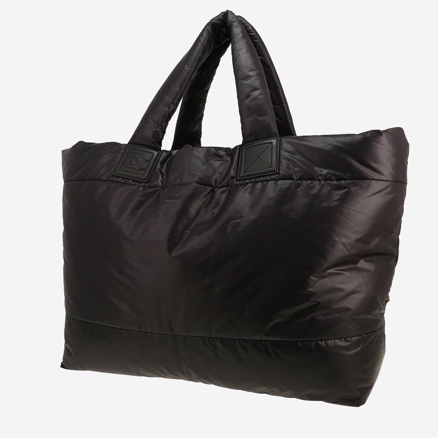 Chanel  Coco Cocoon bag worn on the shoulder or carried in the hand  in black quilted canvas