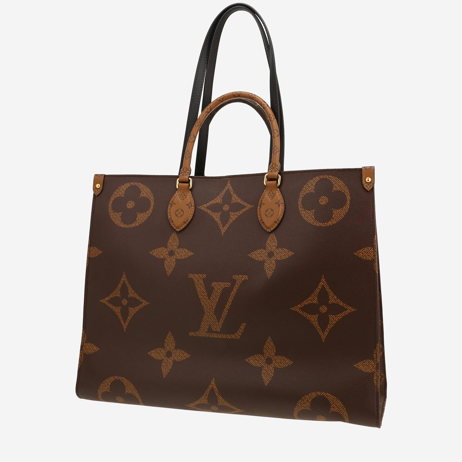 Louis Vuitton  Onthego large model  shopping bag  in brown two tones  monogram canvas  and black leather