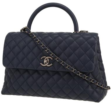 Borsa a tracolla Chanel  Coco Handle in pelle martellata e trapuntata blu marino