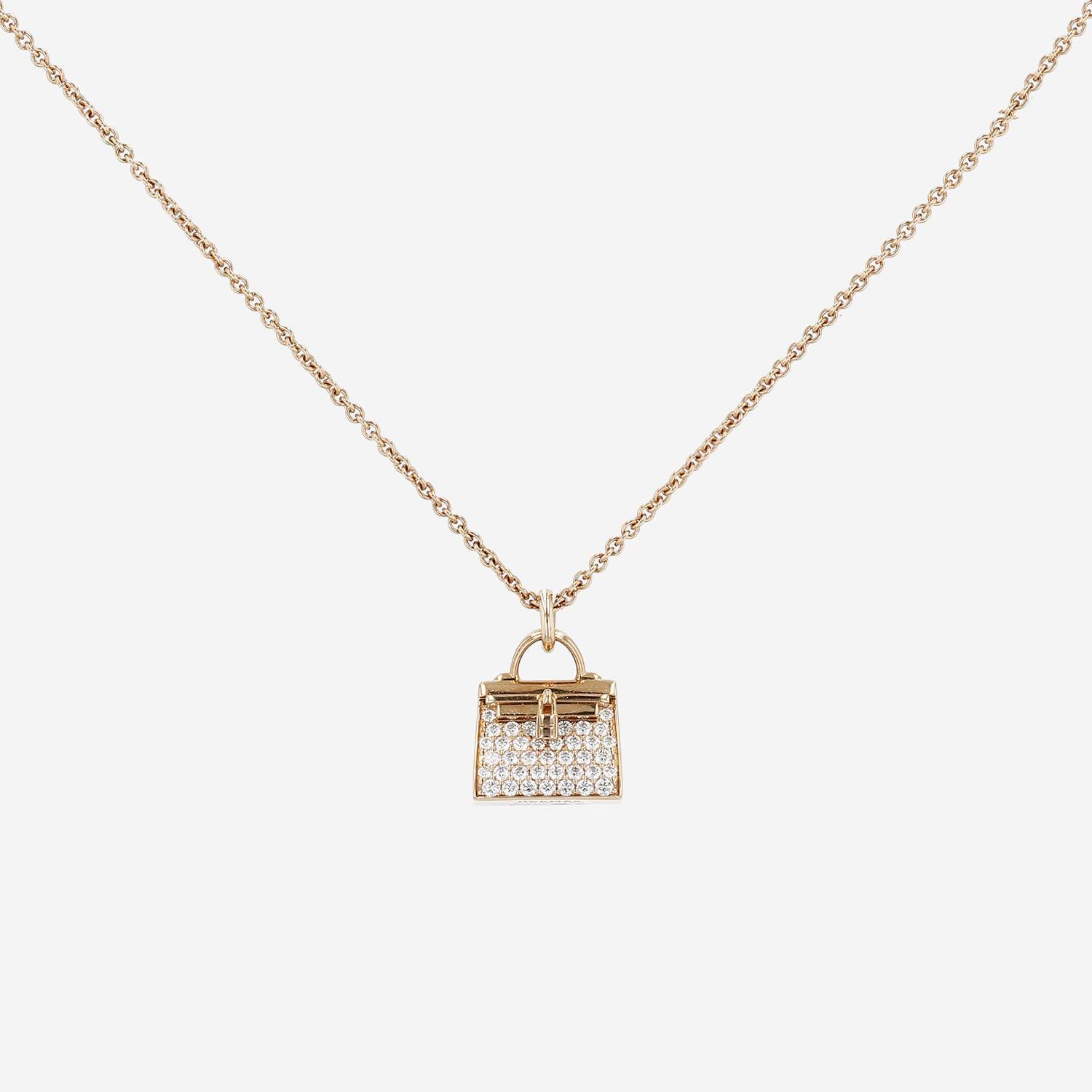 Colgante Hermès Amulettes Kelly de oro rosa y diamantes