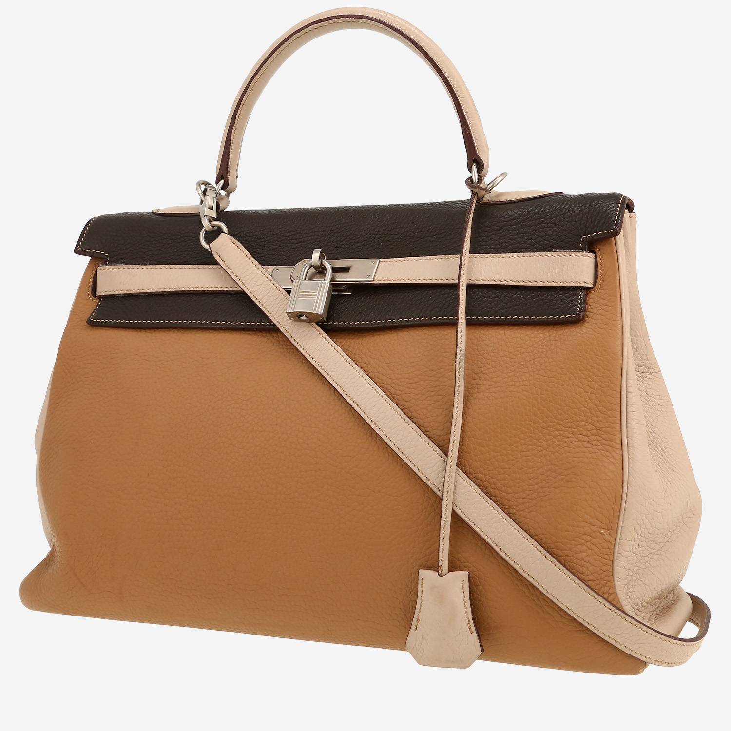 Hermès  Kelly 35 cm handbag  in brown and beige togo leather