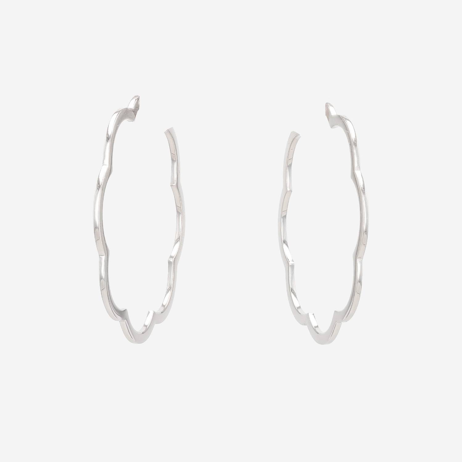 Chanel Camelia hoop earrings in white gold