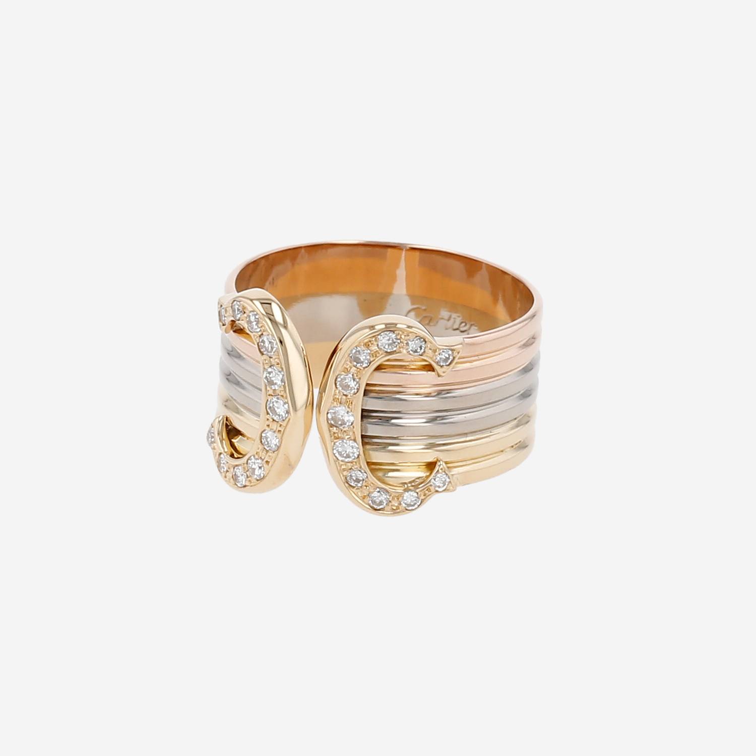 Anello Cartier C de Cartier in 3 ori e diamanti