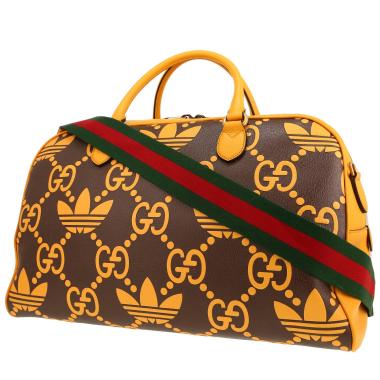 Bolsa de viaje Gucci   en cuero marrón y amarillo