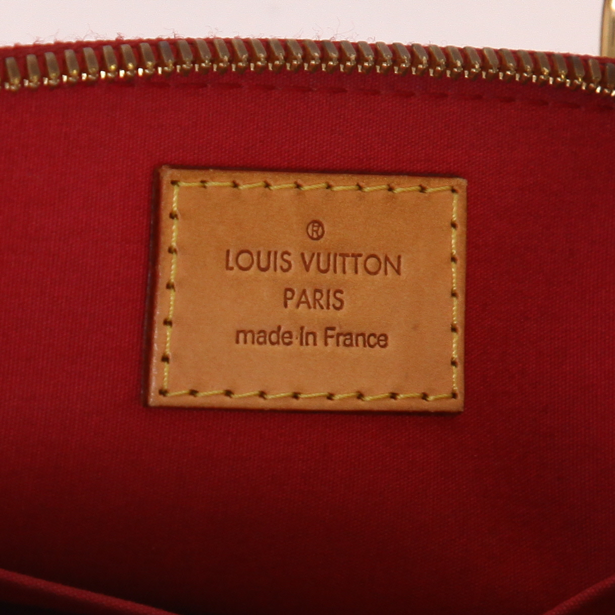 Bolso de mano Louis Vuitton  Alma BB en charol Monogram rosa - Detail D2