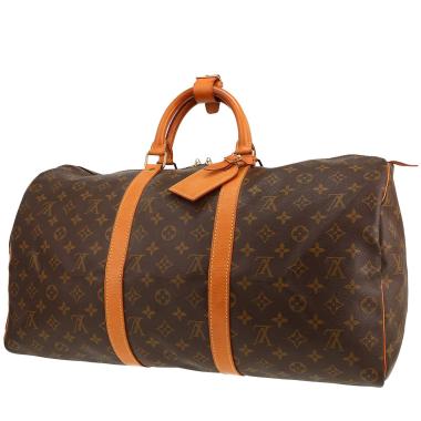 Louis Vuitton  Keepall 50 travel bag  in brown monogram canvas  and natural leather