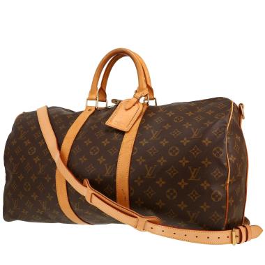 Louis Vuitton  Keepall 50 travel bag  in brown monogram canvas  and natural leather