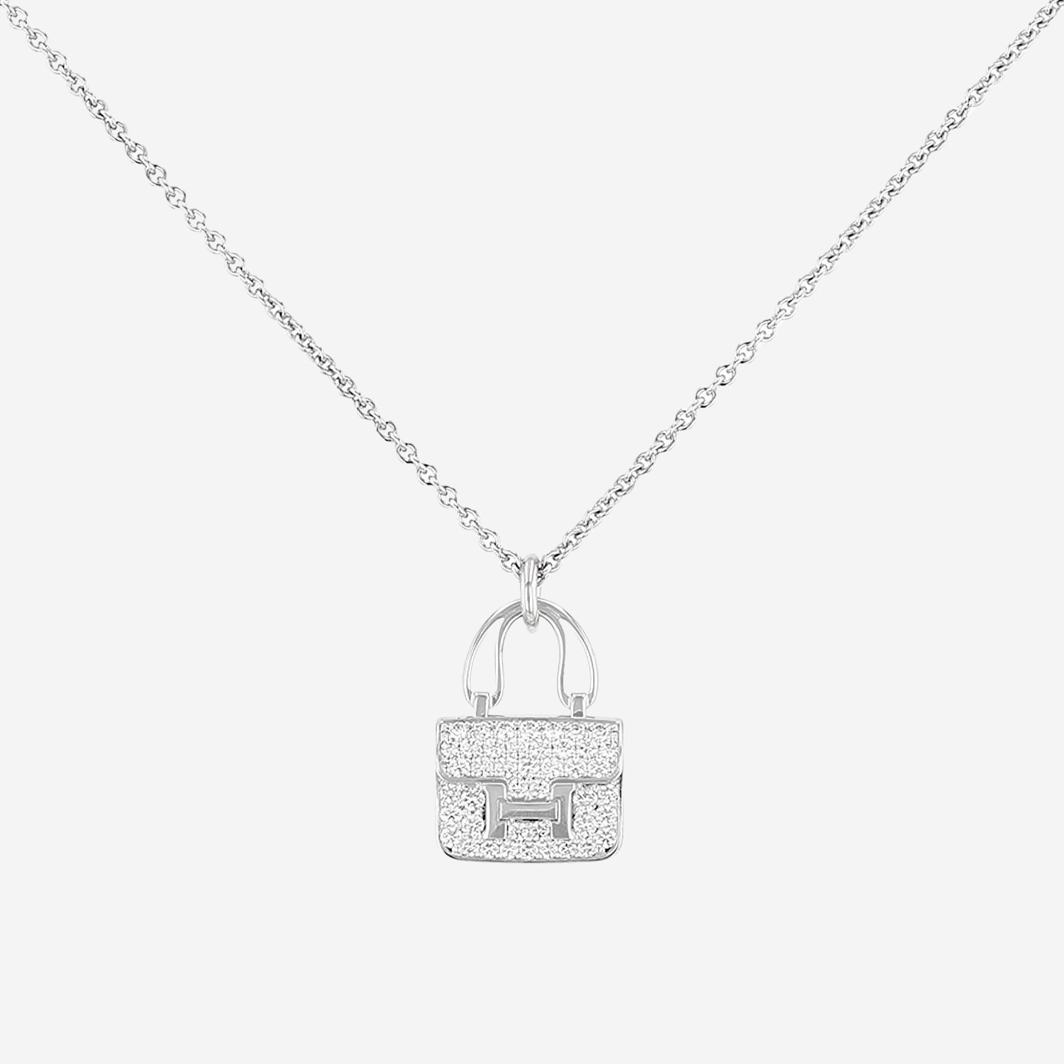 Hermès Amulettes Constance pendant in white gold and diamonds