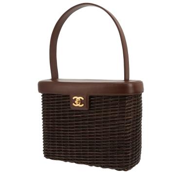 Chanel  Vintage handbag  in brown wicker  and brown leather