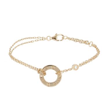 Brazalete Cartier Love de oro amarillo y diamantes