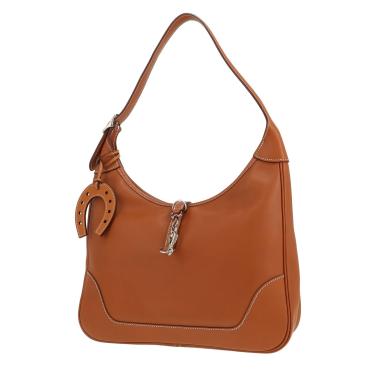 Hermès  Trim bag worn on the shoulder or carried in the hand  in gold Swift leather