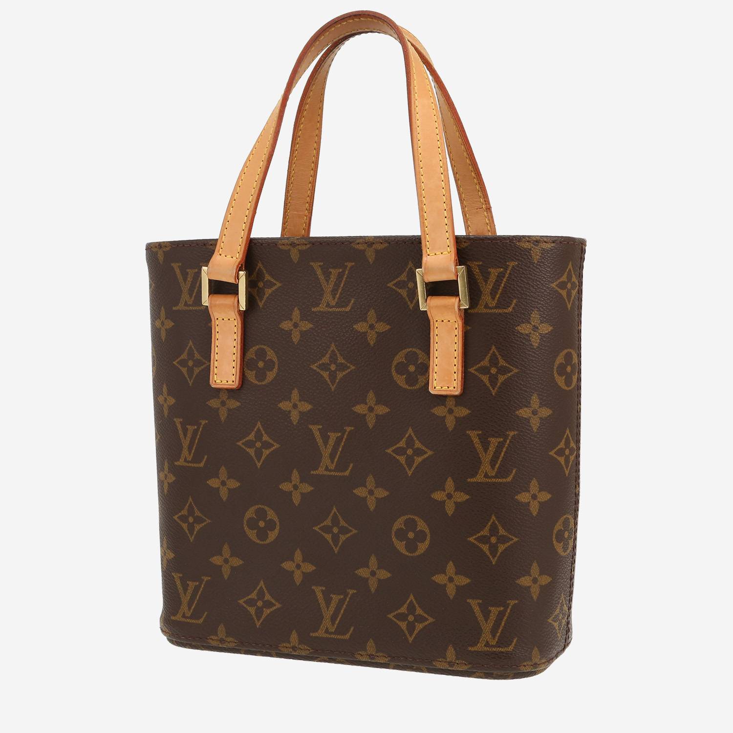 Louis Vuitton   handbag  in brown monogram canvas  and natural leather