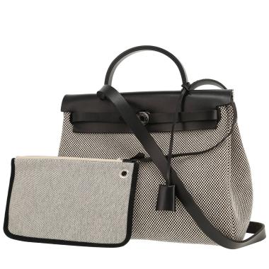 Hermès  Herbag bag worn on the shoulder or carried in the hand  in grey canvas  and black leather