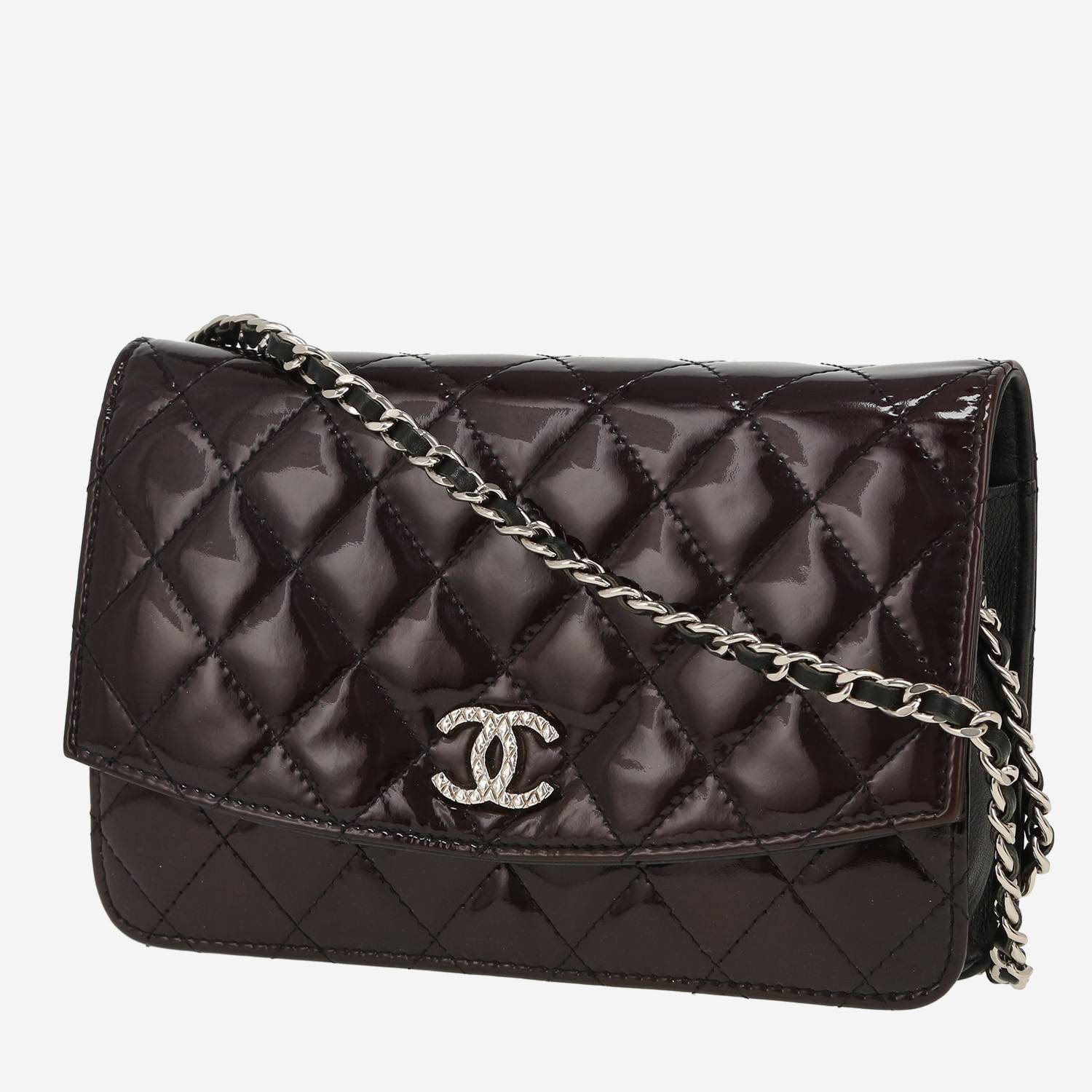 Chanel  Wallet on Chain shoulder bag  in black patent quilted leather