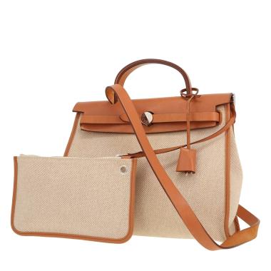 Hermès  Herbag bag worn on the shoulder or carried in the hand  in beige canvas  and Hunter cowhide