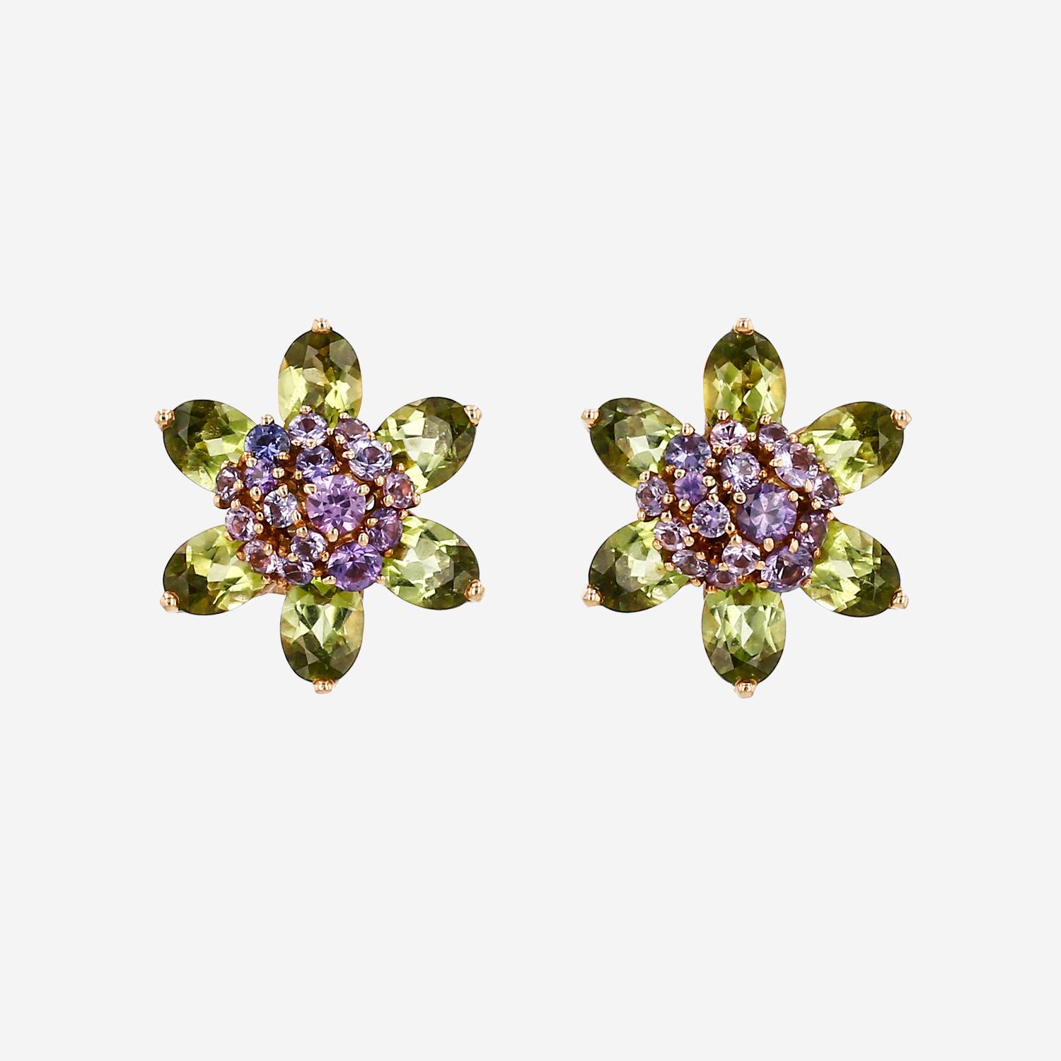Pendientes con clip Van Cleef 
Arpels Hawai de oro amarillo, peridotos y amatistas