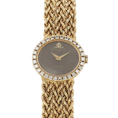 Montre Baume 
Mercier Vintage en or jaune Vers 1970