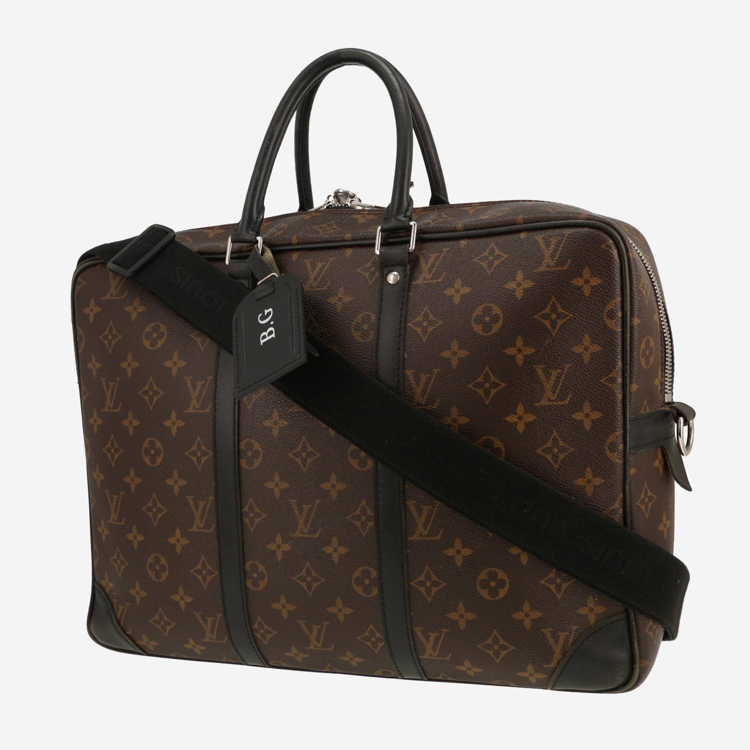 Bolso bandolera Louis Vuitton  Porte documents Voyage en lona Monogram marrón y cuero negro