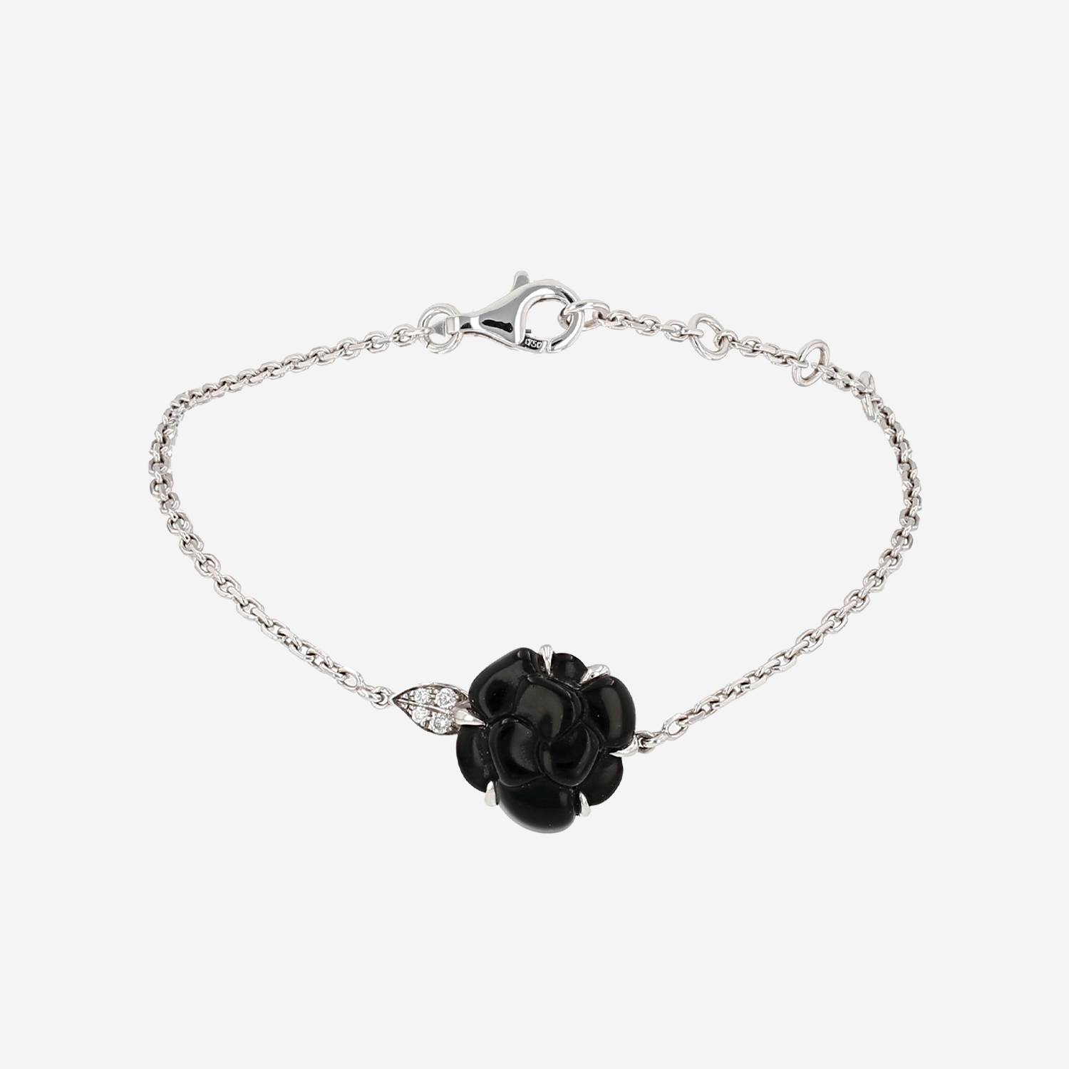 Chanel Camelia bracelet in onyx,  white gold and diamonds
