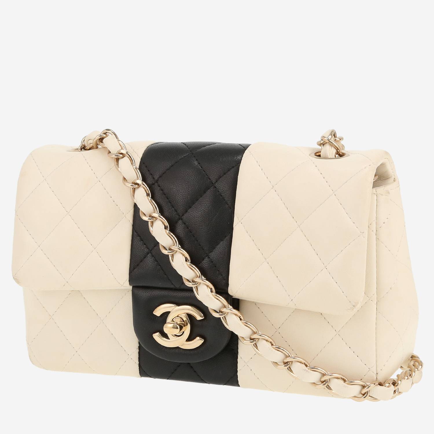 Sac bandoulière Chanel  Mini Timeless en cuir matelassé blanc et noir