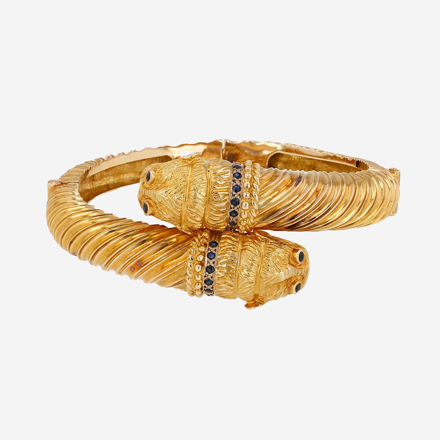 Brazalete articulado Lalaounis Animal Head de oro amarillo y zafiros