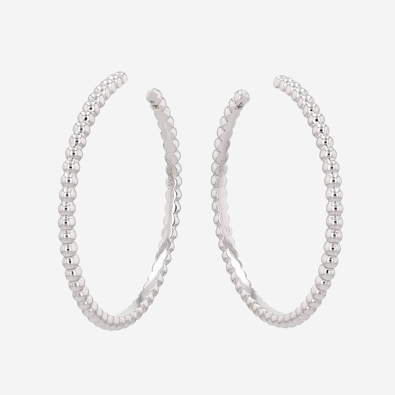 Van Cleef 
Arpels Perlée medium model hoop earrings in white gold