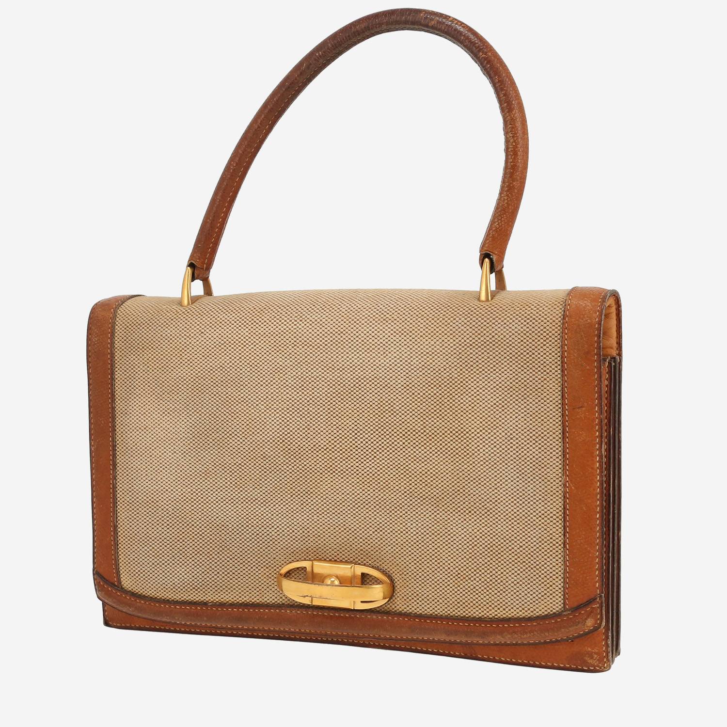 Hermès  Vintage handbag  "H" canvas  and gold Courchevel leather