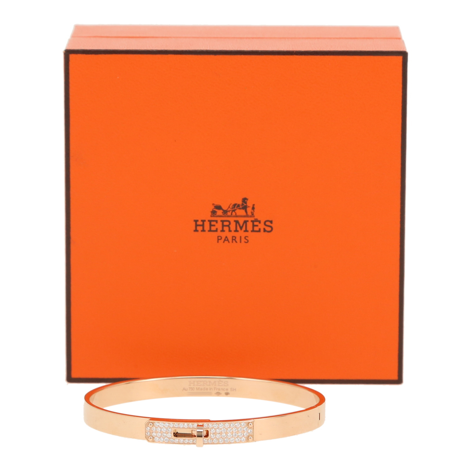 Bracelet jonc Hermès Kelly en or rose et diamants