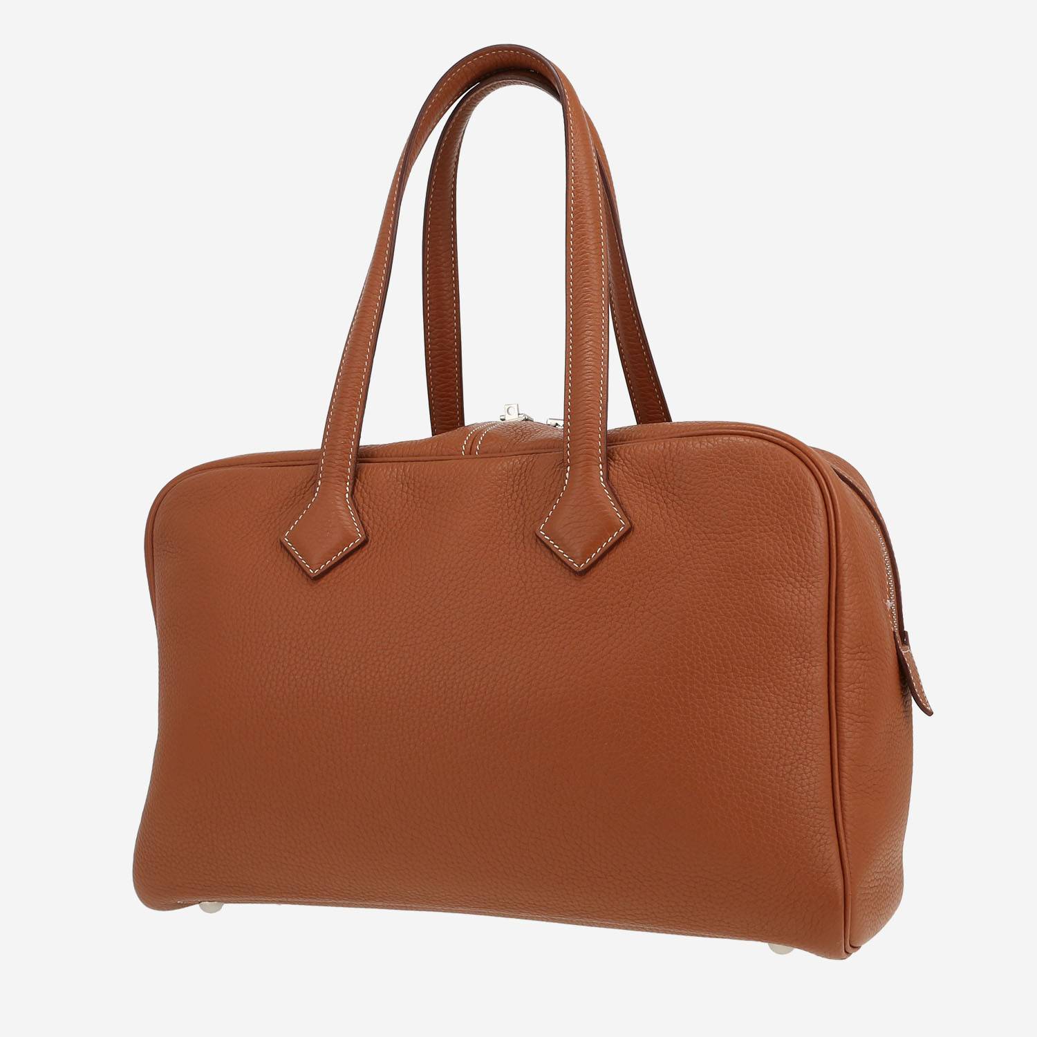 Bolso de mano Hermès  Victoria en cuero togo color oro