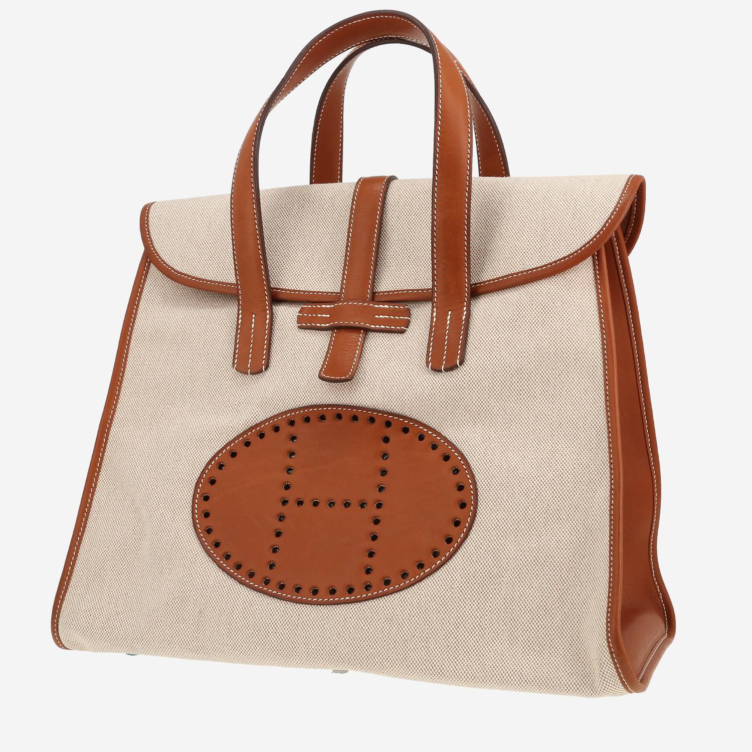 Sac à main Hermès   en cuir Barénia fauve et toile beige