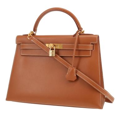 Hermès  Kelly 32 cm handbag  in gold Courchevel leather