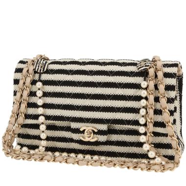 Sac à main Chanel  Timeless Classic en toile noire et blanche et cuir