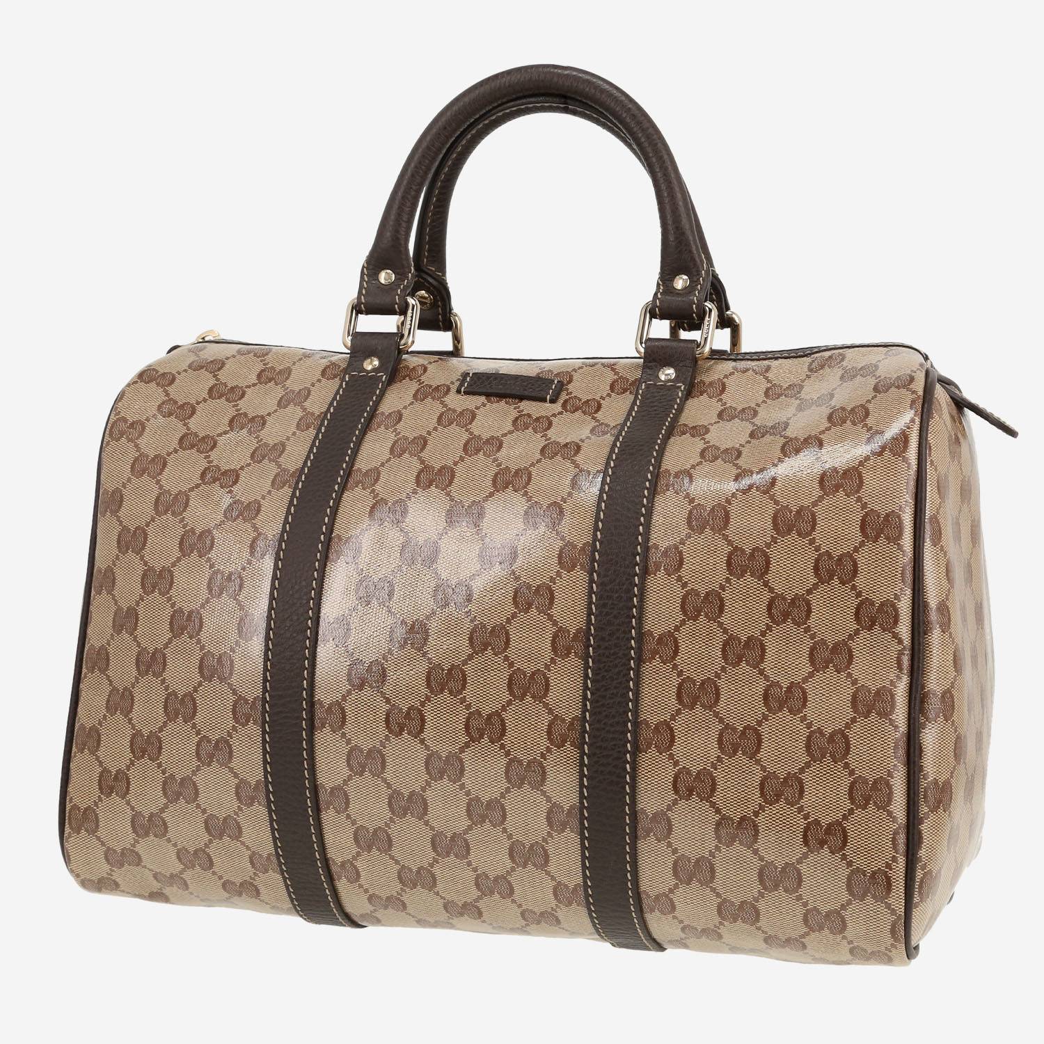 Gucci   handbag  in beige "sûpreme GG" patent canvas  and brown leather