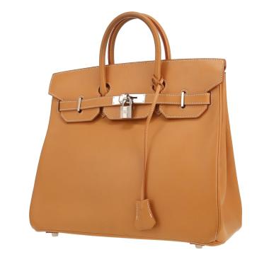 Borsa Hermès  Modello “Haut” con cinturini in pelle naturale Gold