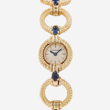 Montre Cartier en or jaune, mouvement signé Edmond Jaeger, Vers 1950