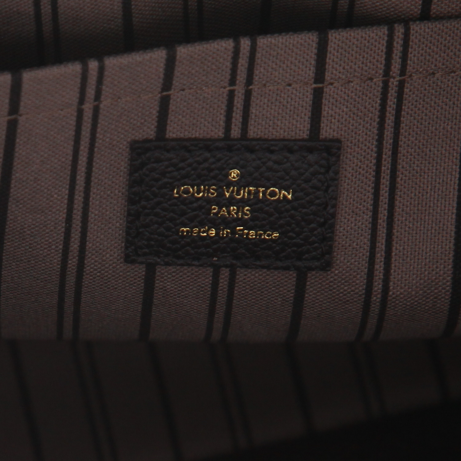 Louis Vuitton  Montaigne handbag  in black empreinte monogram leather - Detail D2