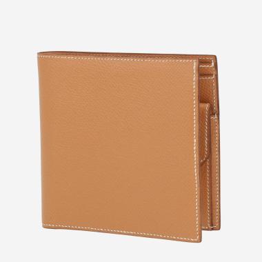 Hermès   wallet  in gold Courchevel leather