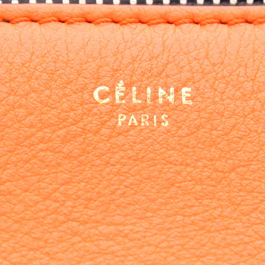 Bolso de mano Celine  Edge en cuero naranja negro y color topo - Detail D2