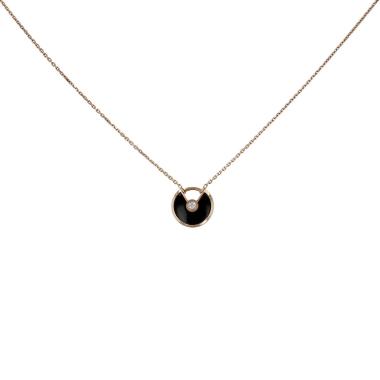 Collier Cartier Amulette taille XS en or jaune, diamant et onyx