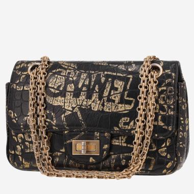 Sac bandoulière Chanel  2.55 mini  en cuir noir et doré