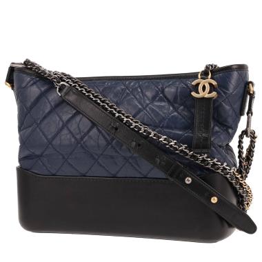 Sac bandoulière Chanel  Gabrielle  moyen modèle  en cuir matelassé bleu-marine et noir