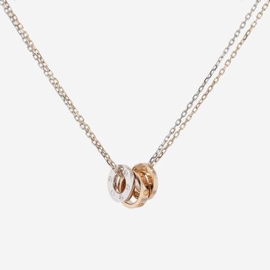 Collier Cartier Love en or rose, or blanc et diamants