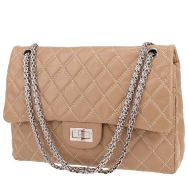 Chanel  2.55 shoulder bag  in beige quilted leather