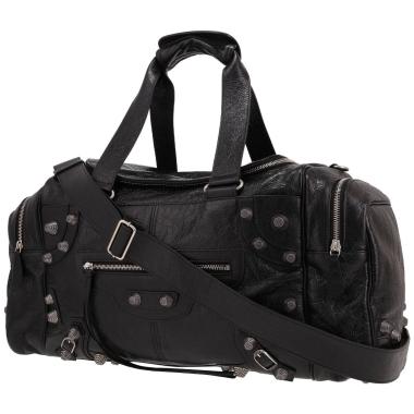 Balenciaga Cagole travel bag in black distressed leather