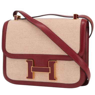 Sac à main Hermès  Constance en toile beige et cuir box rouge H